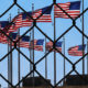 Picture of American flags at U.S.-Mexico border.