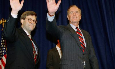 Photo of President George H.W Bush, right, and William Barr