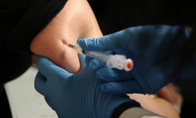 Photo of a woman getting a vaccine in New York