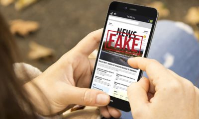 Photo of smartphone with the headline Fake News