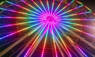 Photo of a ferris wheel at night