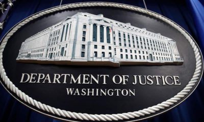 Photo of a sign for the Department of Justice