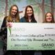 Photo of check presentation of $150,000 from GRAND to the SJCL for the BREN Clinic