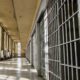 Photo of a prison hall and cells