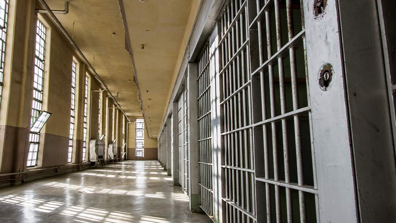 Photo of a prison hall and cells