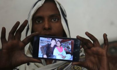 Photo of Pakistani Christian woman Samiya David showing a picture her picture with her Chinese husband