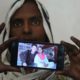 Photo of Pakistani Christian woman Samiya David showing a picture her picture with her Chinese husband