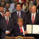 President Donald Trump signs water memo at Bakersfield rally.