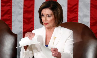 Photo of House Speaker Nancy Pelosi ripping up President Donald Trump's speech