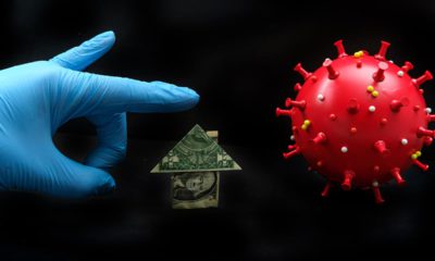 Image of a gloved hand, a dollar bill folded into the shape of a house, and coronavirus symbolizing challenges of paying rents and mortgages during the pandemic