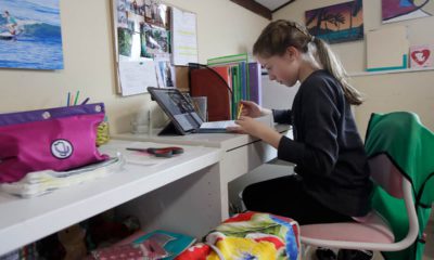 Photo of a girl taking an online class