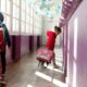 Photo of a child walking to her classroom