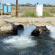 Photo of pumped groundwater flowing into a canal